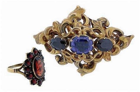 BROOCHES AND RINGS .